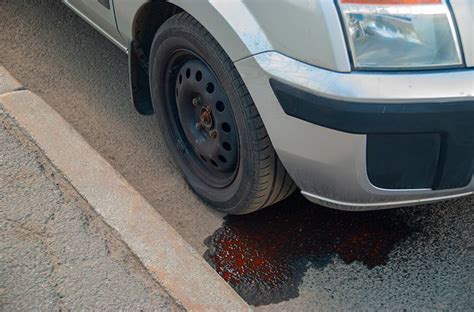 reddish brown fluid leaking from car|Identifying Liquid Leaks: A Guide for Your Car